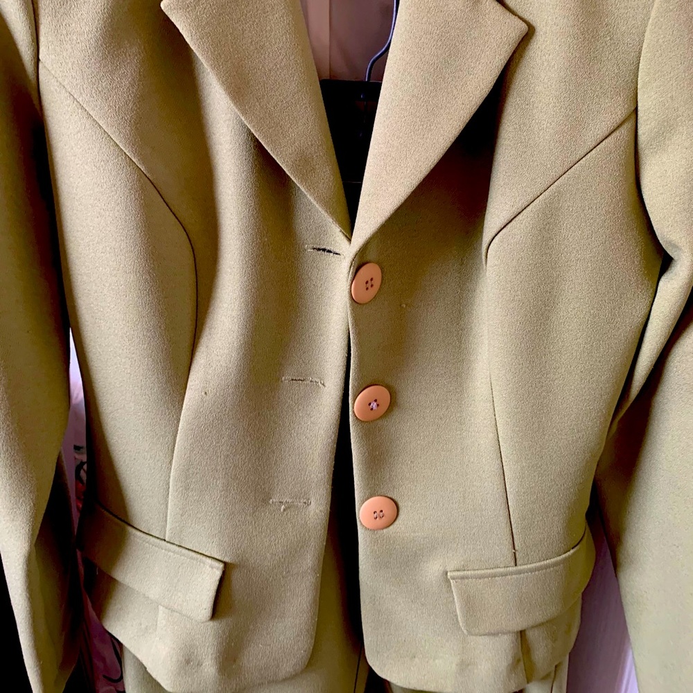 Sage green pant suits.